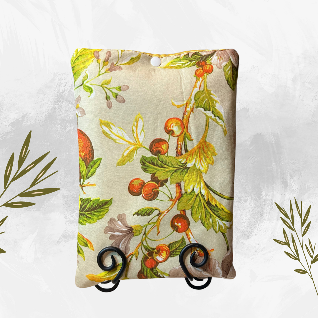 Decorative stand with floral and leaf pattern on a white background